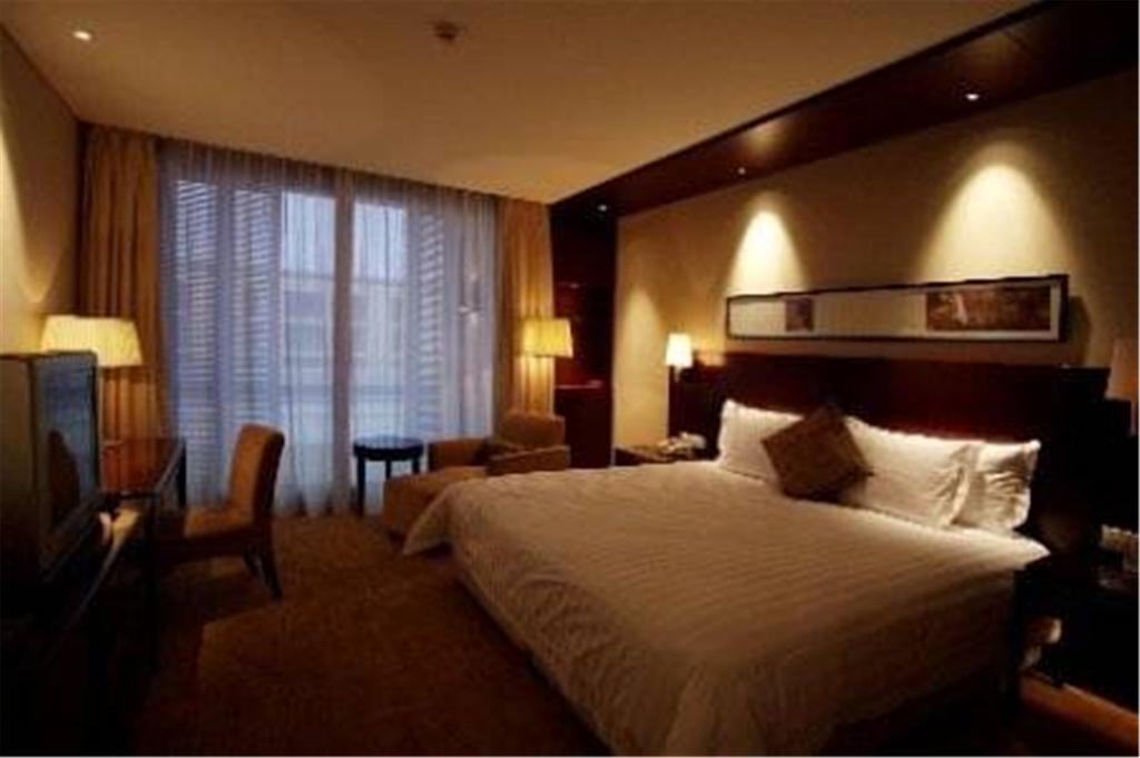 Howard Johnson Plaza Lingang Shanghai Nanhui Стая снимка