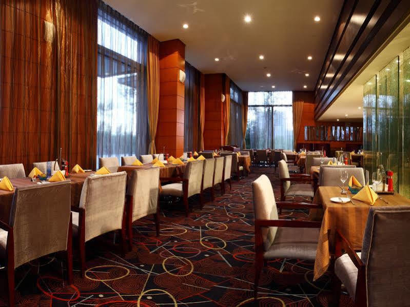 Howard Johnson Plaza Lingang Shanghai Nanhui Екстериор снимка